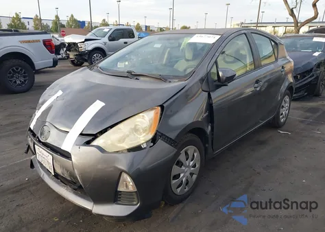 2014 Toyota Prius C One z USA, uszkodzony, nr VIN JTDKDTB30E1574119